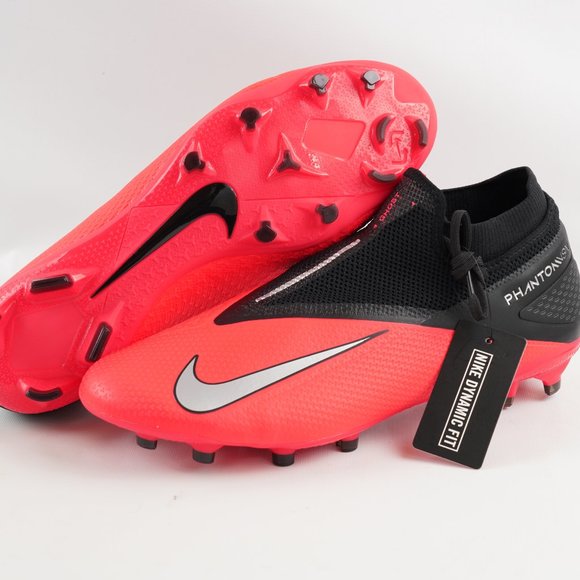 black and orange soccer cleats